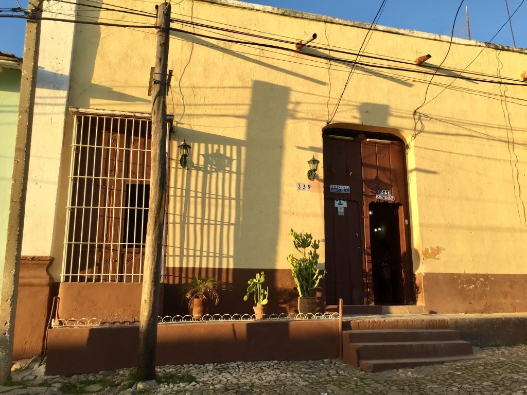 a building in the morning light, shadows falling on the facade